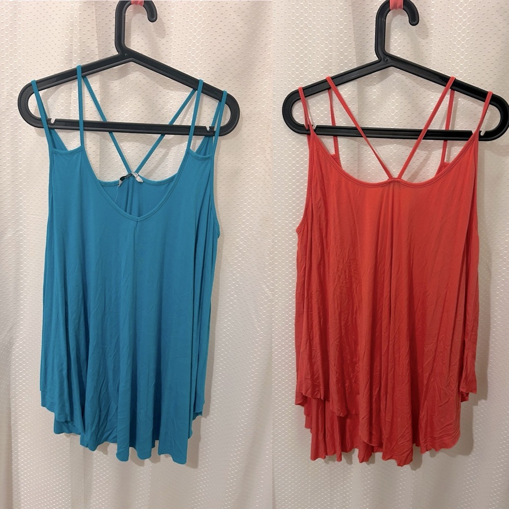 Two oversized tanks/cover ups